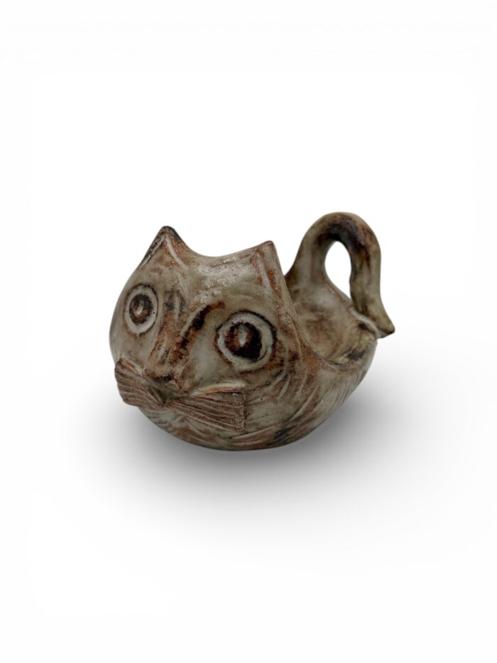 Olivier Pettit (1918–1979), “cat” catchall