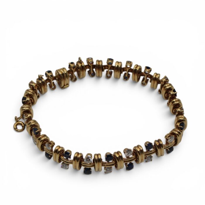 02CC4FC2 1A88 4344 A507 BFDA89FEB730 1 105 C Boucheron, Bracelet Diamants et Saphirs