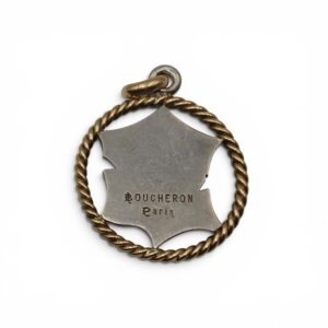 5AF1222B FFA4 49D0 8FB3 67026C36B14A 1 105 C Boucheron, Pendentif Médaillon porte-bonheur